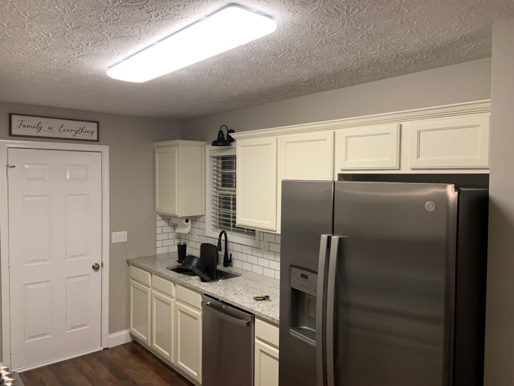 White kitchen with subway tile backsplash