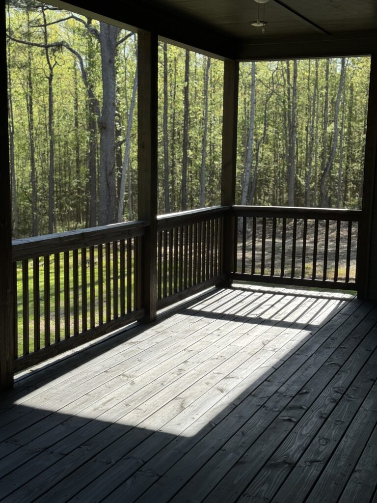 Porch with freshly stained deck boards
