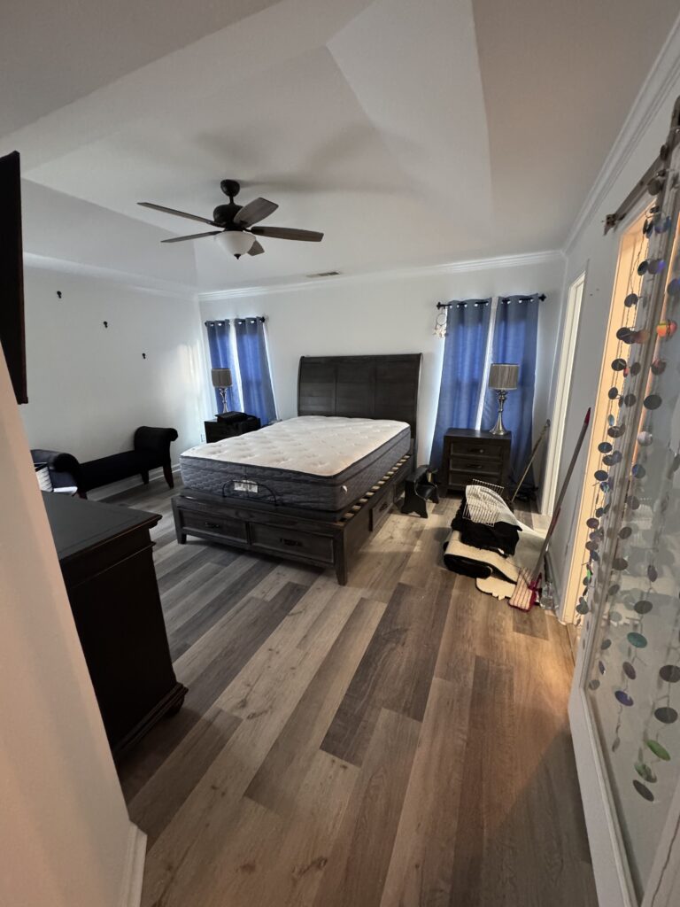 Bedroom with new vinyl plank flooring