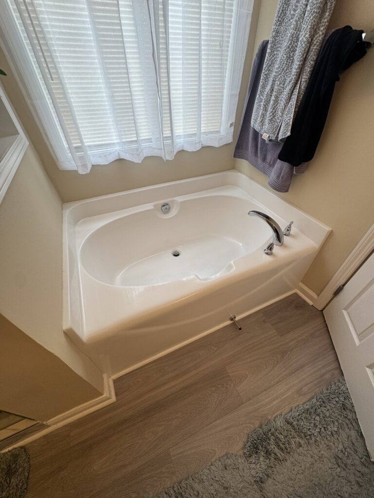 Bathtub with new tile surround