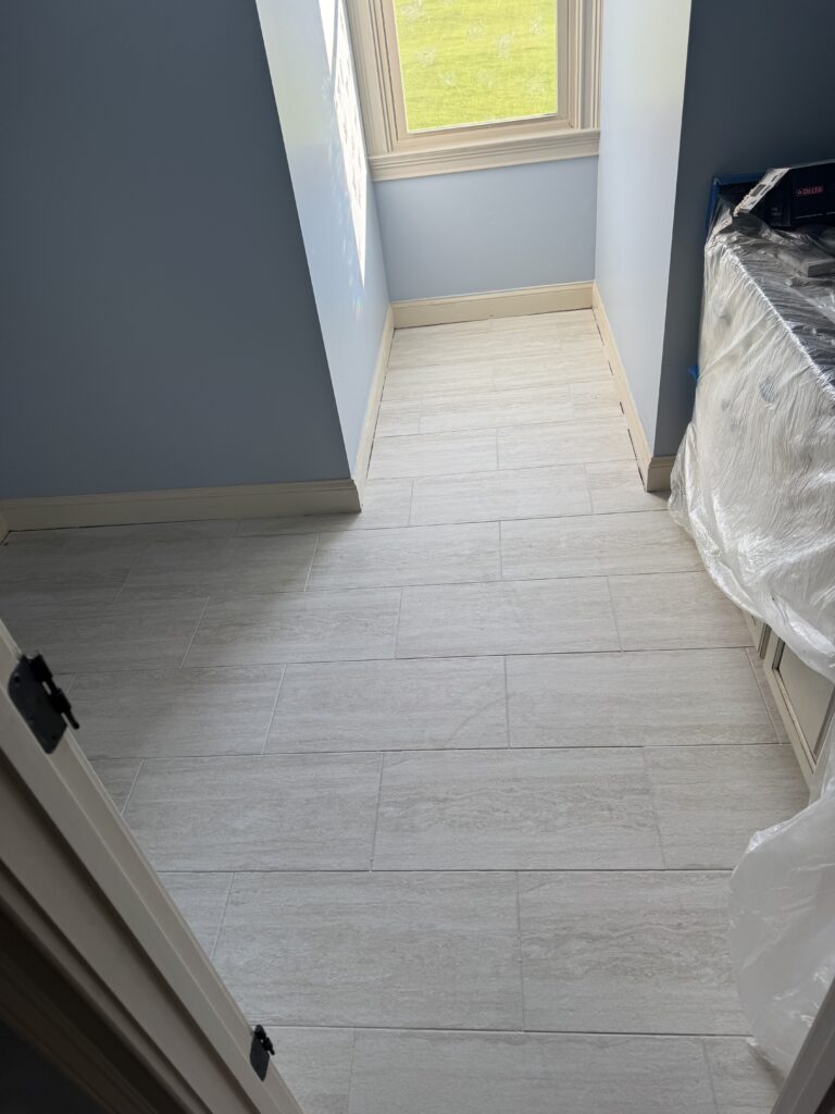 Bathroom with new porcelain tile floor